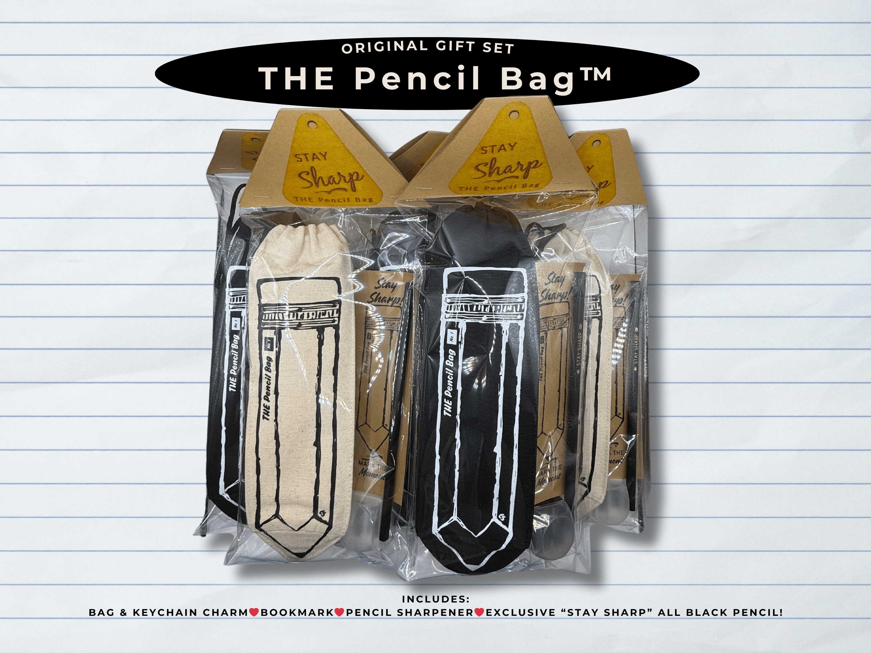 Packaged product set with pencil bag, keychain charm, bookmark, pencil sharpener, and black pencil on lined paper background.