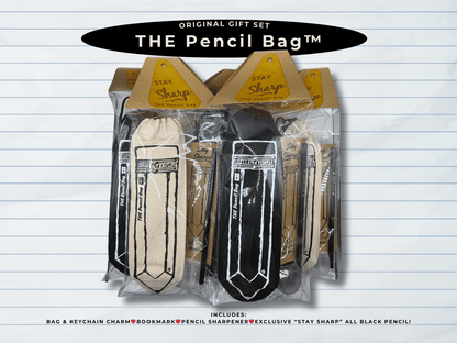 Packaged product set with pencil bag, keychain charm, bookmark, pencil sharpener, and black pencil on lined paper background.